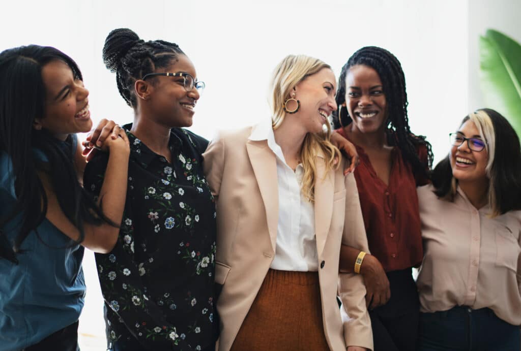 Diverse confident businesswomen standing together
