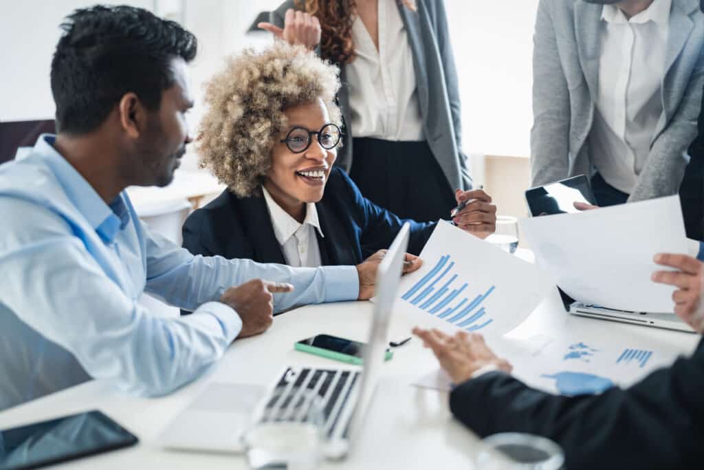 Multiracial business people working together in modern office –